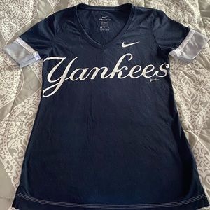 Nike New York Yankees shirt.